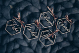Ziemassvētku rotājumi ar vārdu heksagona formā